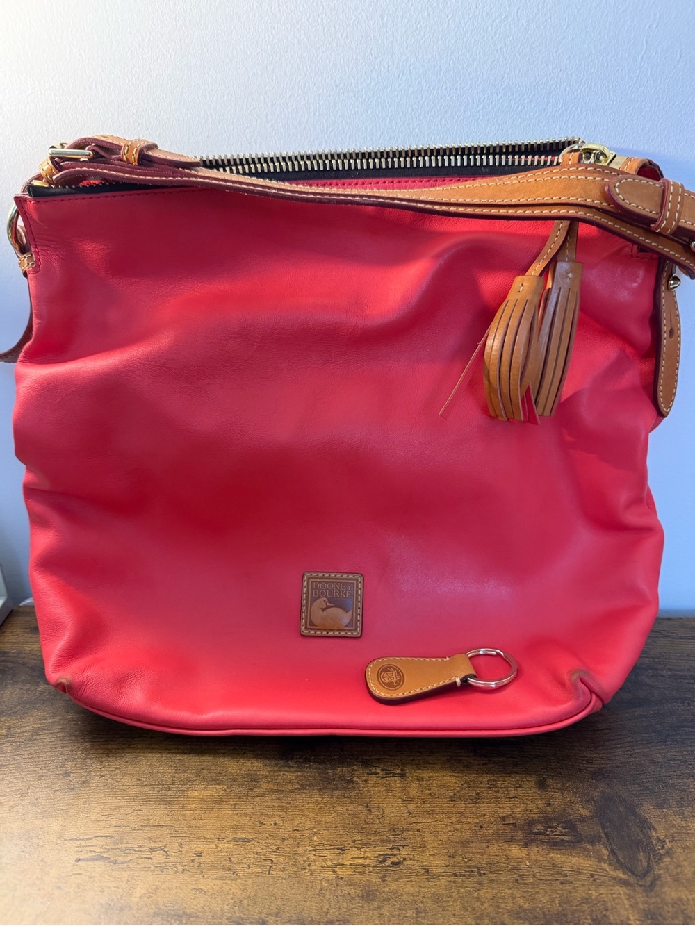 Dooney & Bourke Red Leather Shoulder Bag with Brown Trim and Tassel
